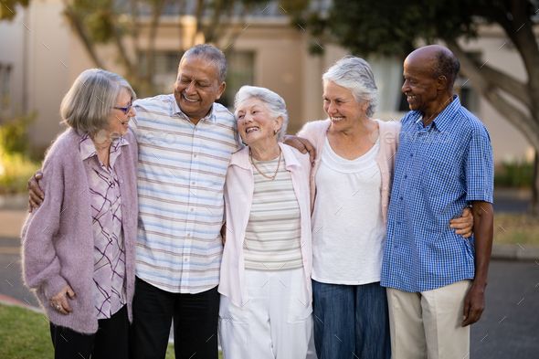 Neighbours talking outside their homes.